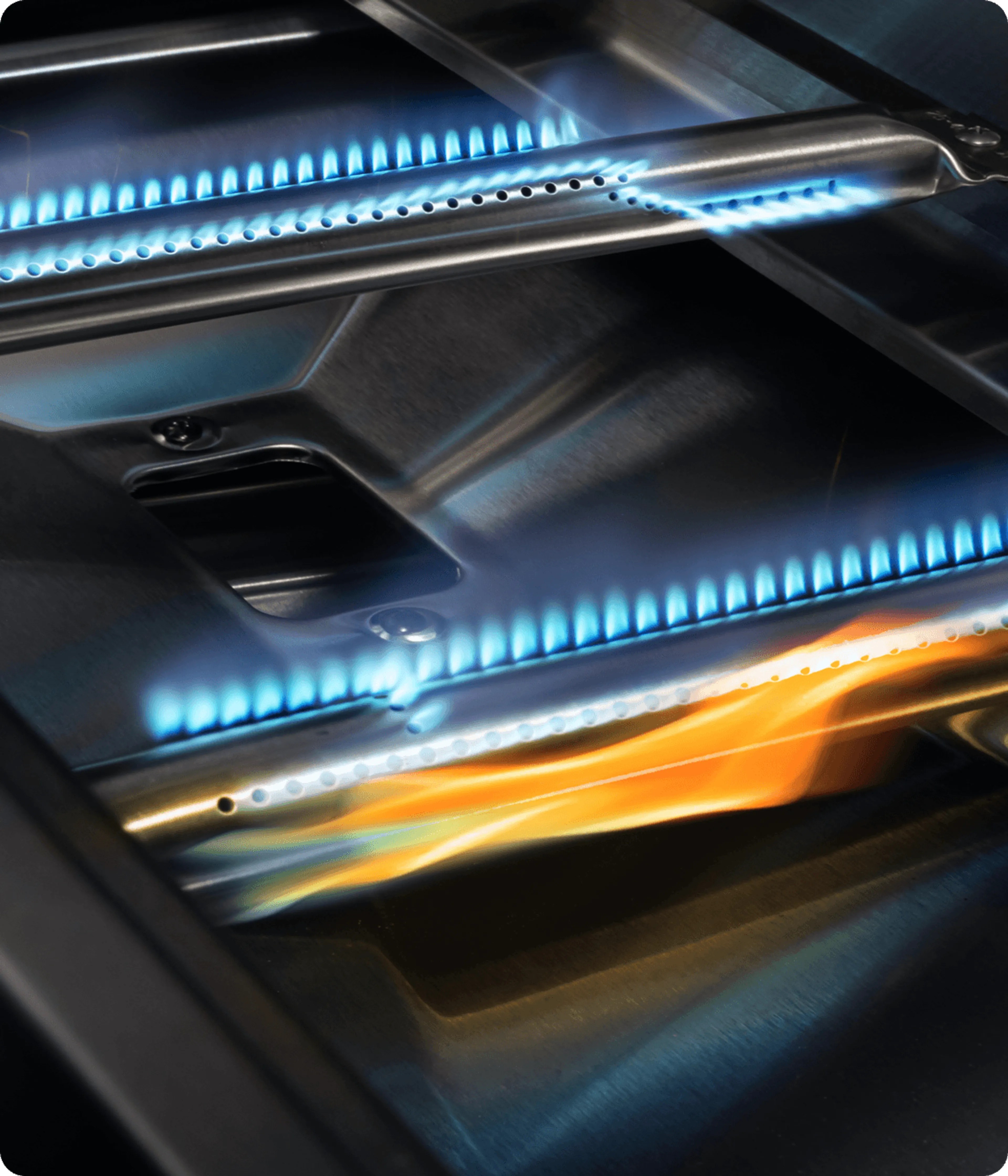 Edelstahl Brenner im Gasgrill FRED mit gleichmäßiger blauer Flamme und Kickstarter Zündflamme