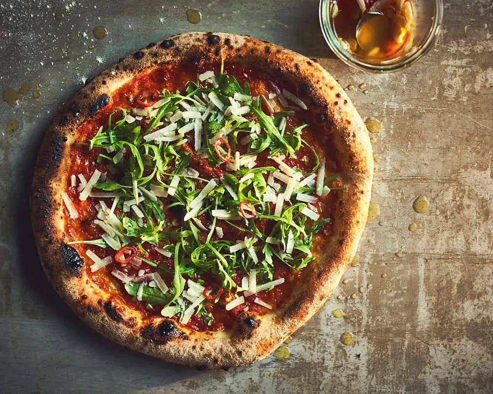 Pizza Rucola mit Chili-Öl